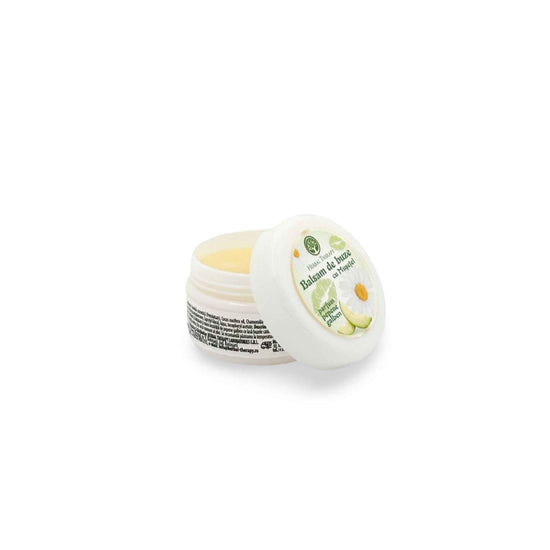 Spatele borcanului cosmetic cu balsam de buze cu mușețel și pepene galben, Herbal Therapy, cu detalii despre ingrediente.